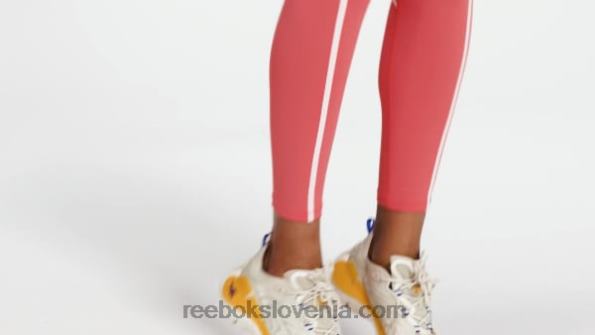 Reebok luksuzne hlačne nogavice colorblock z visokim pasom R22JR347 pol oranžna flare ženske