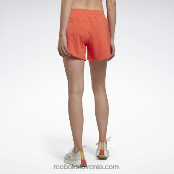 Reebok tekaške hlače R22JR554 pol oranžna flare ženske